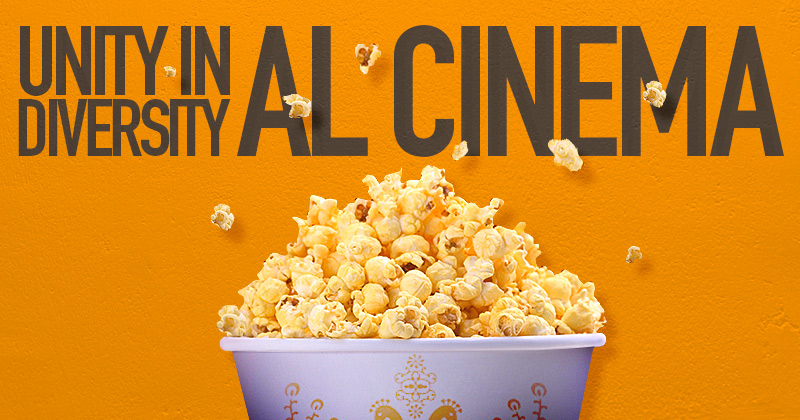 un bicchiere di popcorn su sfondo arancione: unity in diversity al cinema